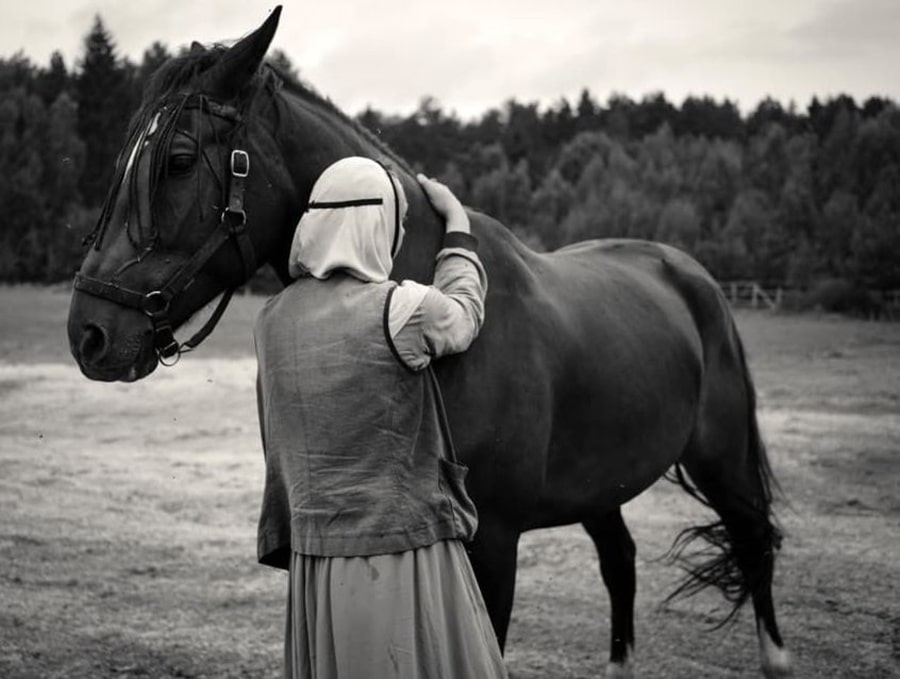 nun with horse